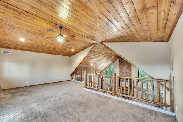 bonus room featuring visible vents, carpet flooring, vaulted ceiling, wooden ceiling, and baseboards