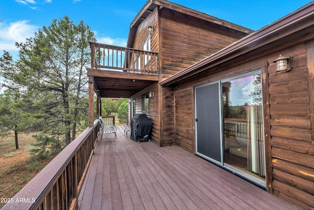 deck featuring grilling area