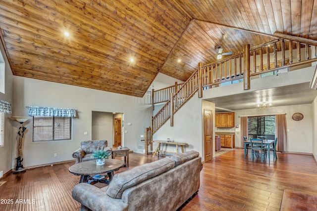 living room with stairway, wood-type flooring, and wood ceiling