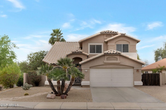 9509 W Tonopah Dr, Peoria, AZ 85382 - mediterranean / spanish-style home with driveway, stucco siding, and a tile roof