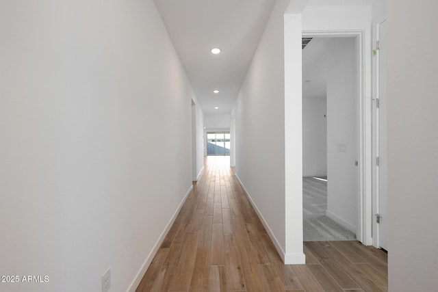 hallway featuring light wood-type flooring