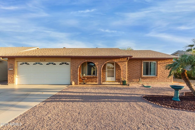 single story home with a garage