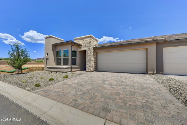 view of front of home featuring a garage