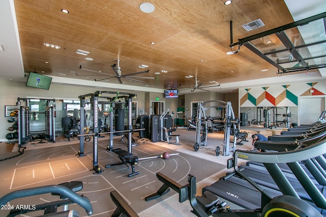 gym with wooden ceiling and ceiling fan