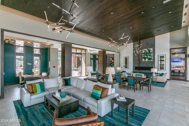 tiled living room with wood ceiling and a high ceiling