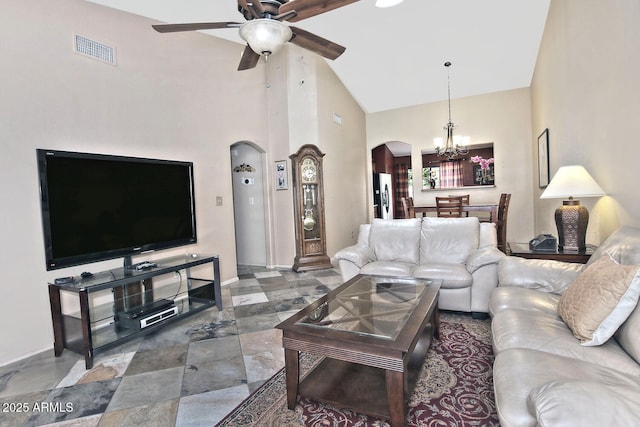 3510 E Hampton Ave Unit 74, Mesa, AZ 85204 - living room with arched walkways, a chandelier, ceiling fan, high vaulted ceiling, and baseboards