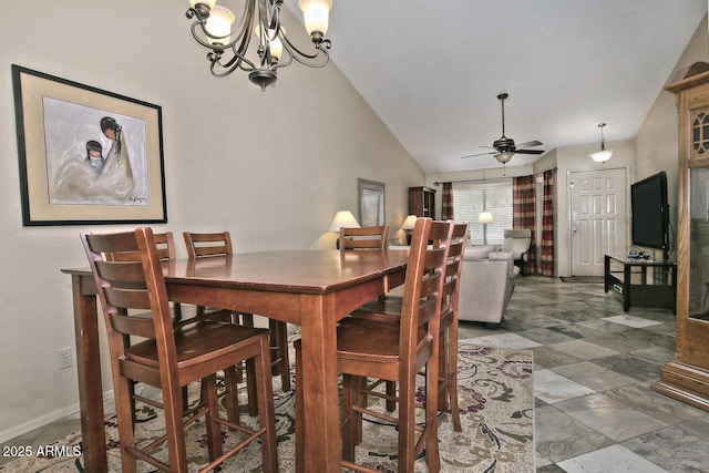 3510 E Hampton Ave Unit 74, Mesa, AZ 85204 - dining room featuring a ceiling fan, a chandelier, lofted ceiling, and baseboards