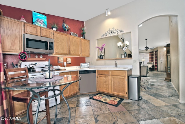 3510 E Hampton Ave Unit 74, Mesa, AZ 85204 - kitchen with appliances with stainless steel finishes, a sink, stone tile flooring, and light countertops