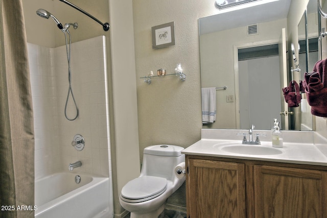 3510 E Hampton Ave Unit 74, Mesa, AZ 85204 - full bathroom featuring a textured wall, toilet, vanity, and shower / bath combination