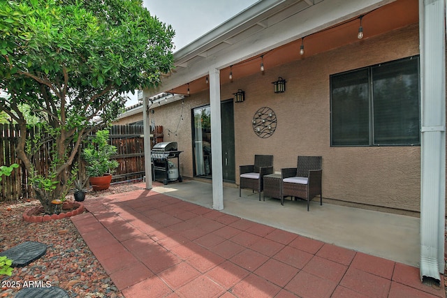 3510 E Hampton Ave Unit 74, Mesa, AZ 85204 - view of patio / terrace featuring a grill and fence