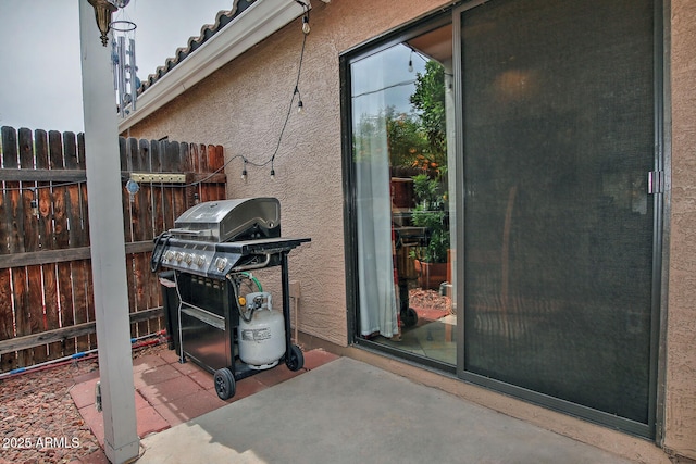 3510 E Hampton Ave Unit 74, Mesa, AZ 85204 - view of patio with area for grilling and fence
