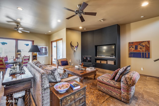 living room featuring ceiling fan