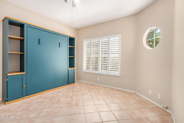 8874 W Piute Ave, Peoria, AZ 85382 - unfurnished bedroom featuring a ceiling fan, a closet, and baseboards