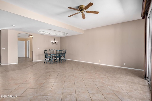 8874 W Piute Ave, Peoria, AZ 85382 - unfurnished living room with arched walkways, light tile patterned flooring, a ceiling fan, a chandelier, and baseboards