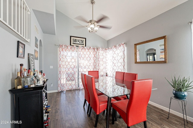 dining area with ceiling fan, dark hardwood / wood-style floors, and lofted ceiling