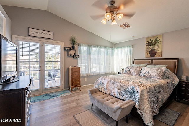 bedroom featuring access to outside, ceiling fan, light hardwood / wood-style floors, and lofted ceiling