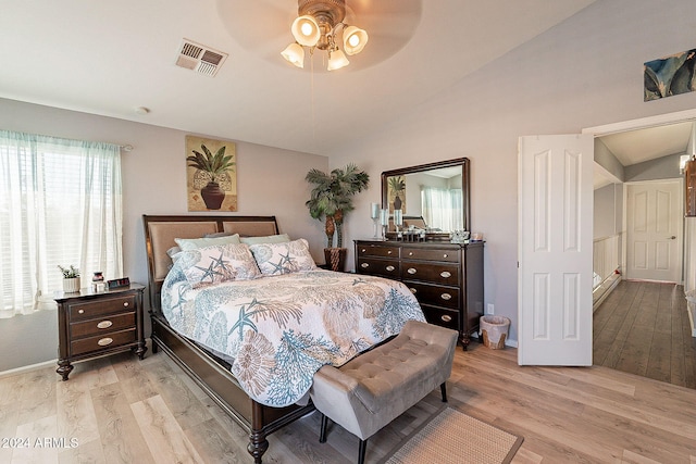 242 E Stonebridge Dr, Gilbert, AZ 85234 - bedroom with light wood finished floors, lofted ceiling, baseboards, and a ceiling fan
