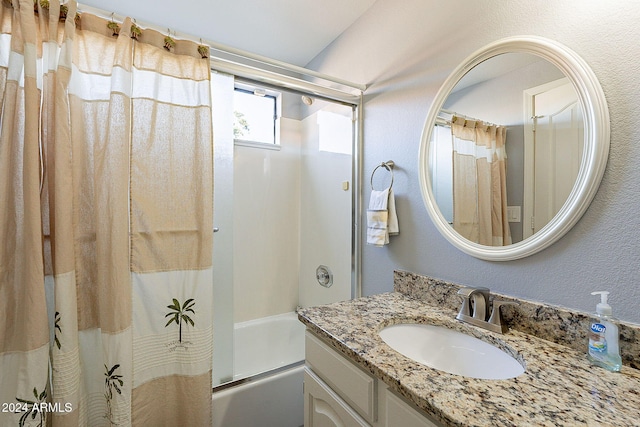 242 E Stonebridge Dr, Gilbert, AZ 85234 - bathroom with shower / bathtub combination with curtain, vanity, and a textured wall