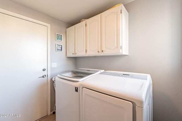 242 E Stonebridge Dr, Gilbert, AZ 85234 - laundry room featuring washing machine and clothes dryer and cabinet space