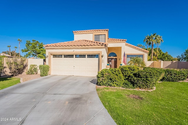 242 E Stonebridge Dr, Gilbert, AZ 85234 - mediterranean / spanish home with driveway, a garage, stucco siding, and a tile roof