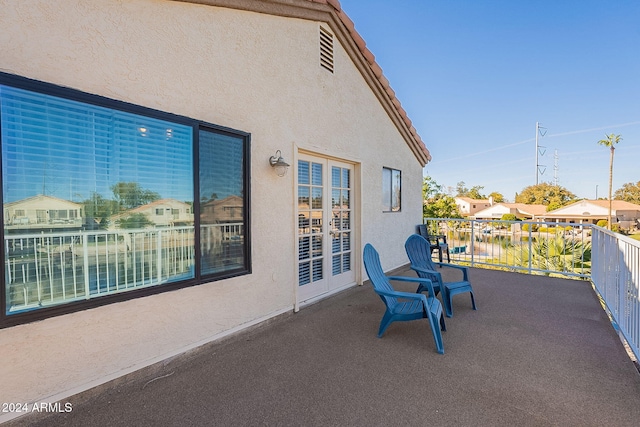 view of patio with a balcony