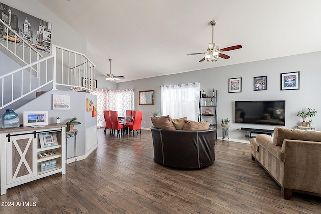 living room featuring lofted ceiling, ceiling fan, and dark hardwood / wood-style floors