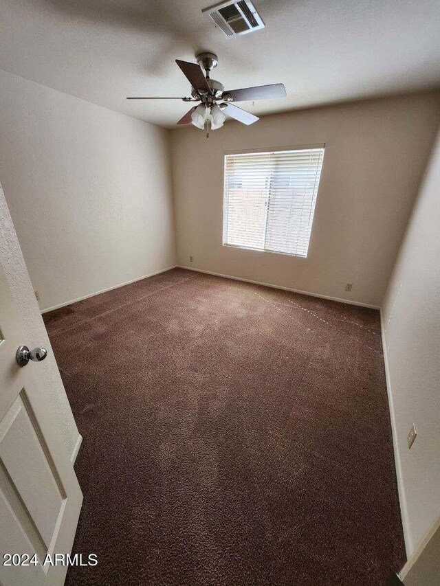 3853 W Calle Lejos, Glendale, AZ 85310 - carpeted empty room with a ceiling fan and baseboards