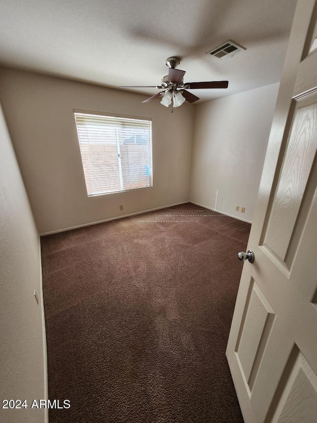 3853 W Calle Lejos, Glendale, AZ 85310 - unfurnished room with ceiling fan and carpet flooring