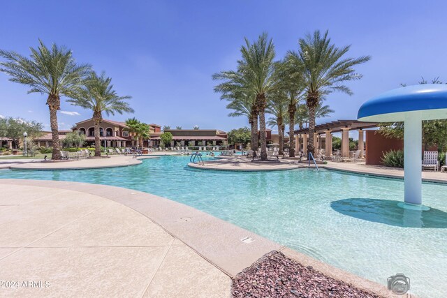 view of swimming pool featuring a patio area