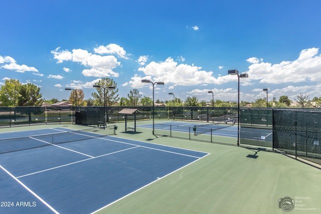 view of tennis court with basketball court