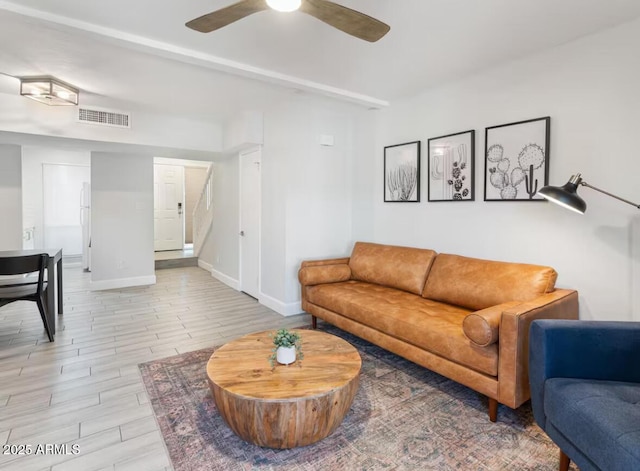 living room featuring ceiling fan