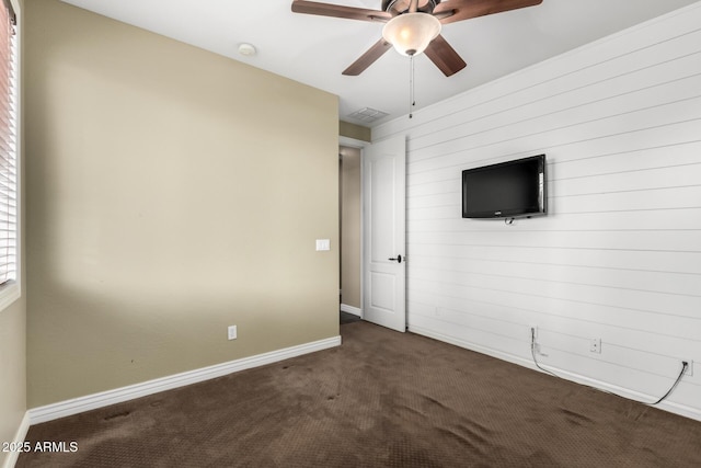 530 S Emerson St, Chandler, AZ 85225 - unfurnished room with carpet, a ceiling fan, wooden walls, and baseboards