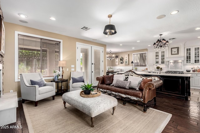 530 S Emerson St, Chandler, AZ 85225 - living area with a chandelier, recessed lighting, french doors, and wood finished floors
