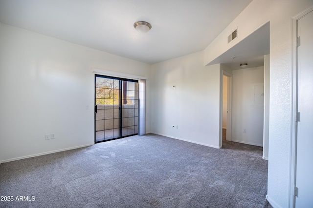 empty room featuring carpet floors