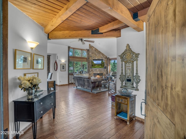 interior space featuring baseboards, wooden ceiling, vaulted ceiling with beams, and wood-type flooring