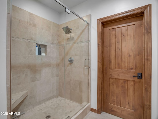bathroom featuring a shower stall