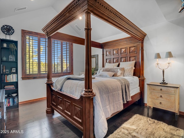 bedroom with dark wood-style floors, visible vents, lofted ceiling, and baseboards