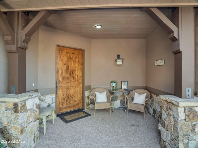 entrance to property with a patio area