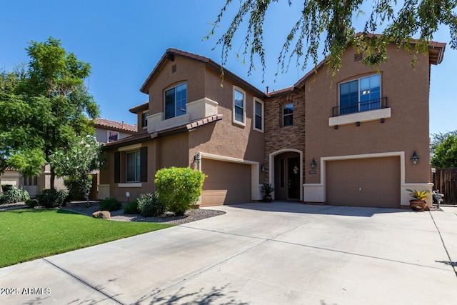 3693 E Sparrow Pl, Chandler, AZ 85286 - view of front of house with an attached garage, stucco siding, driveway, a front lawn, and stone siding
