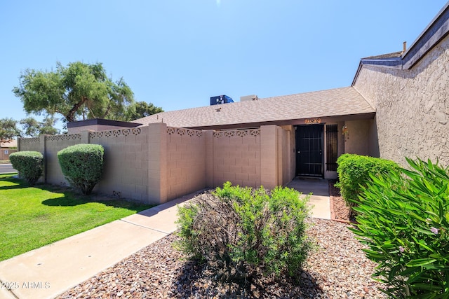 17802 N 45th Ave, Glendale, AZ 85308 - doorway to property with fence and stucco siding