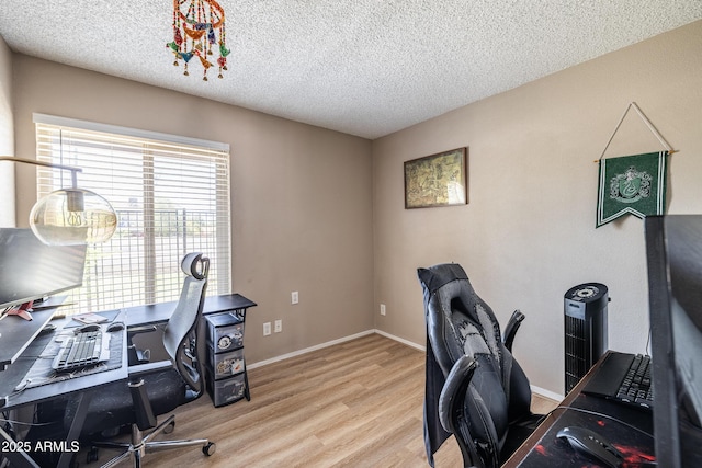 17802 N 45th Ave, Glendale, AZ 85308 - office area featuring baseboards, a textured ceiling, and wood finished floors