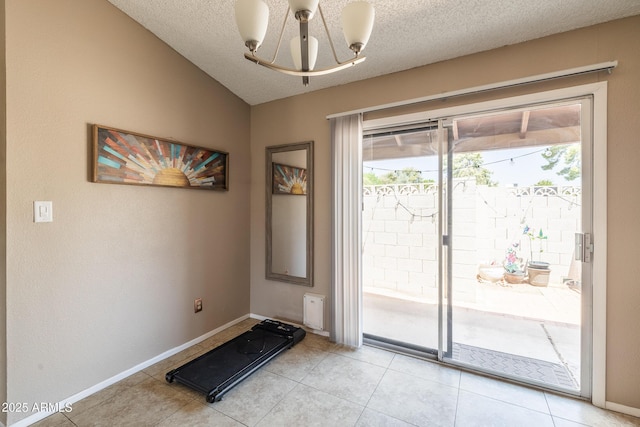 17802 N 45th Ave, Glendale, AZ 85308 - doorway to outside with a textured ceiling, a chandelier, baseboards, and lofted ceiling