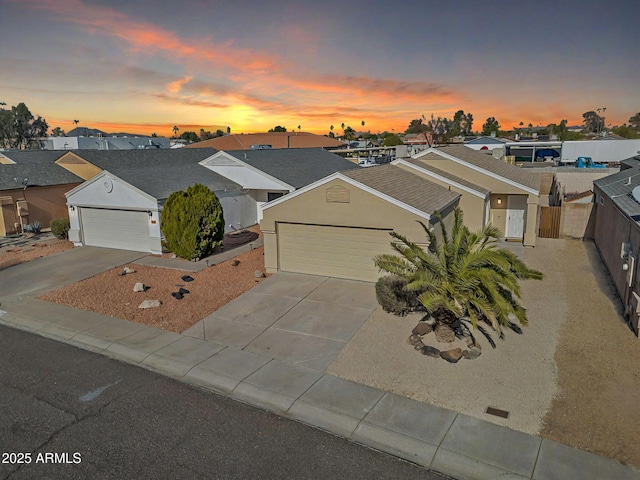 view of front of property with a garage