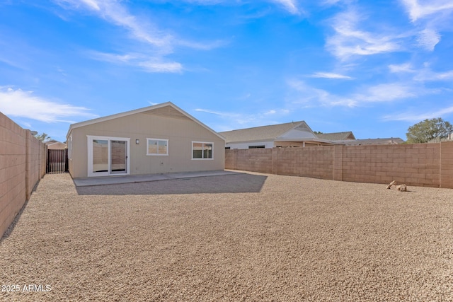 back of house with a patio area