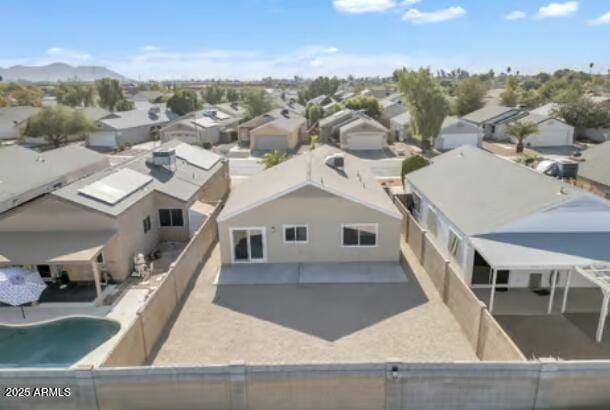 birds eye view of property featuring a mountain view