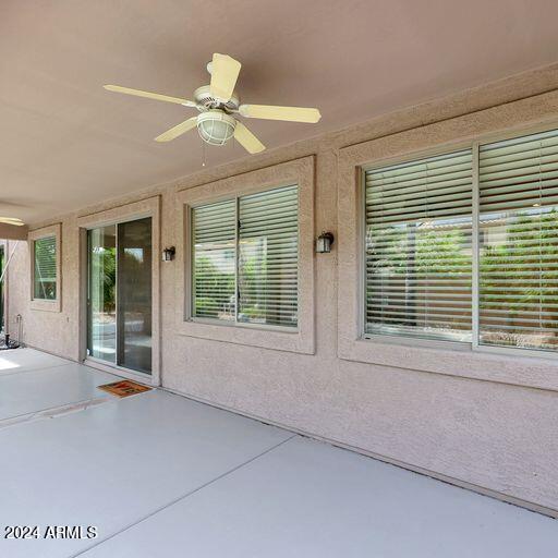 view of patio featuring ceiling fan