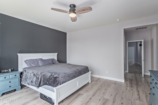 bedroom featuring ceiling fan and light wood-type flooring