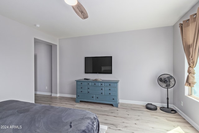 unfurnished bedroom with light wood-type flooring and ceiling fan