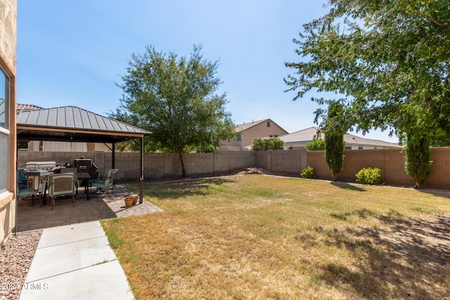 view of yard with a gazebo and a patio