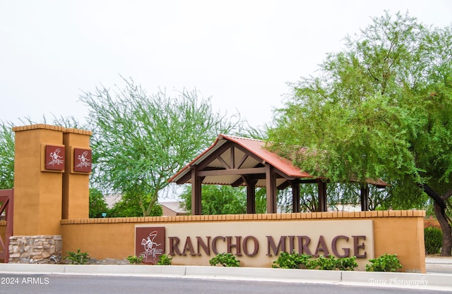 view of community sign